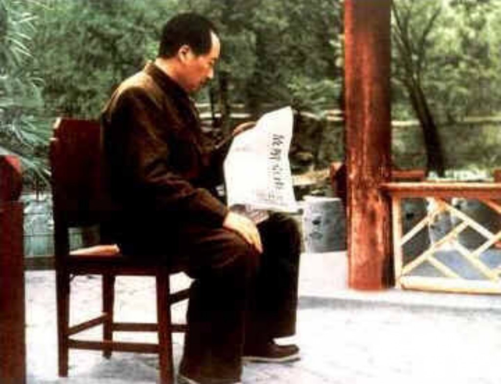 Mao Zedong reading a report about the occupation on Nanking at the Shuangqing Villa in the Western Hills outside Beiping, April 1949