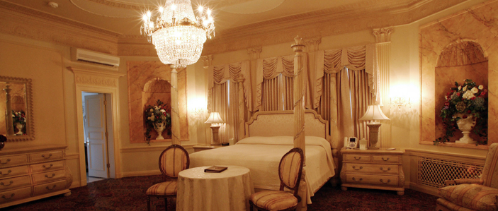 A bedroom at the Mar-a-Lago resort, ready for an embalmed corpse and votive offerings